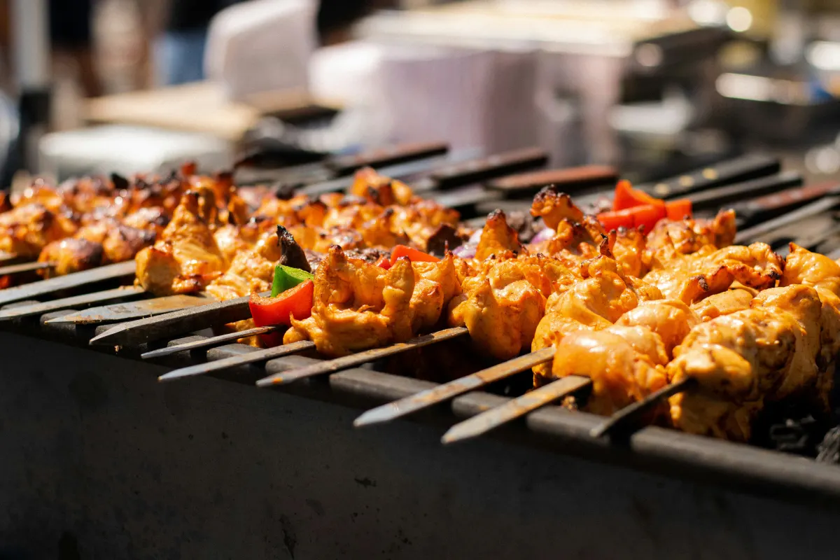 Chicken skewers on a charcoal grill